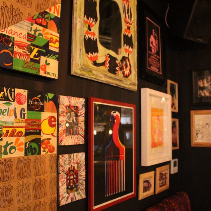 A restaurant wall with pictures