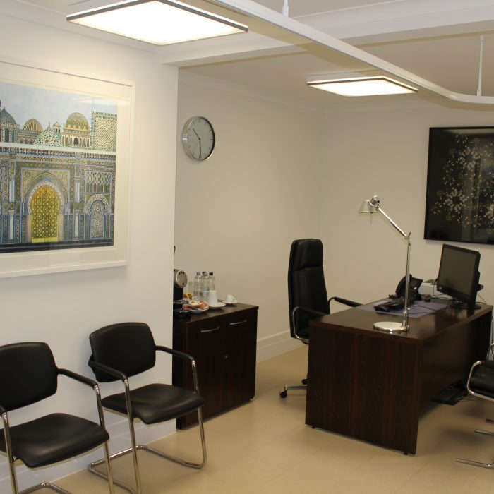 An office with a temple picture on a wall