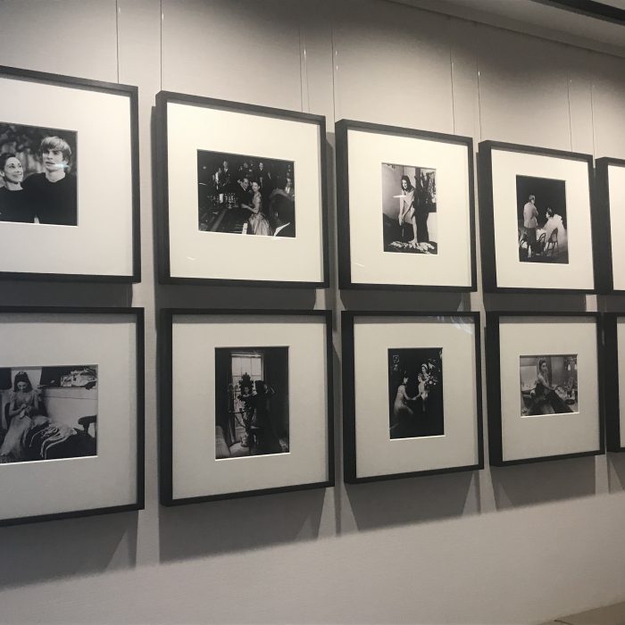 A wall with black and white photos
