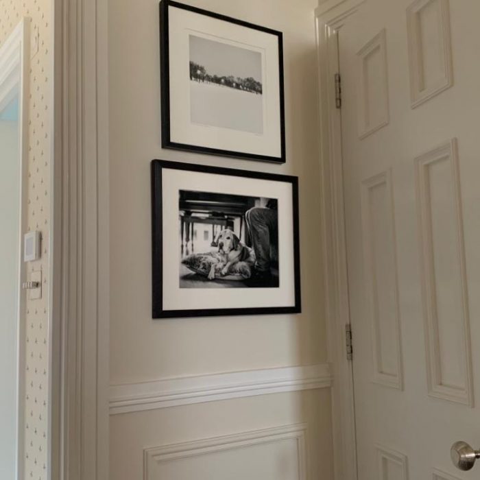 2 black and white photos on a wall
