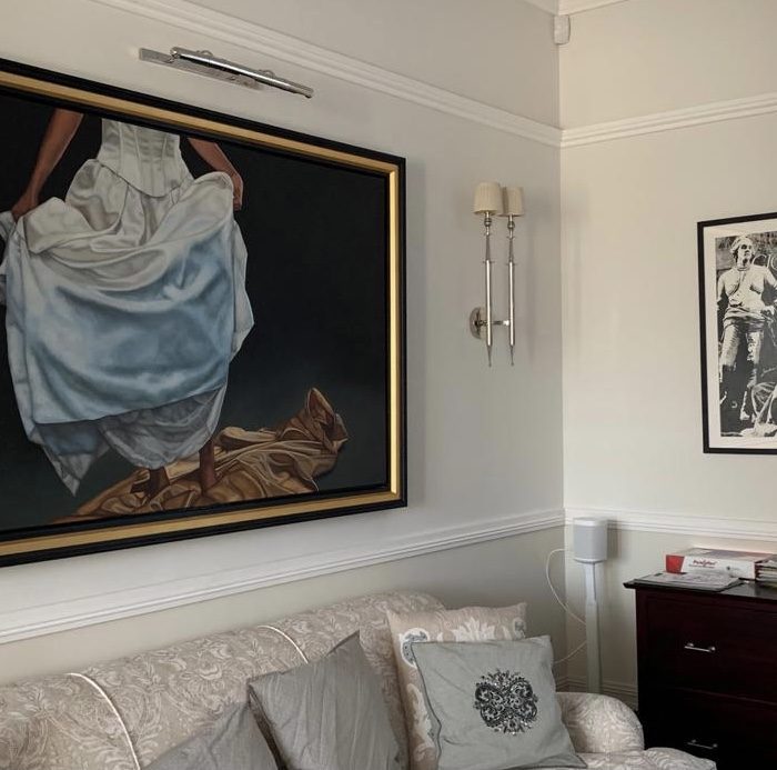 A painting above a sofa