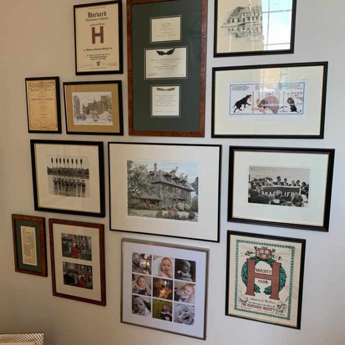 Several framed pictures on the wall